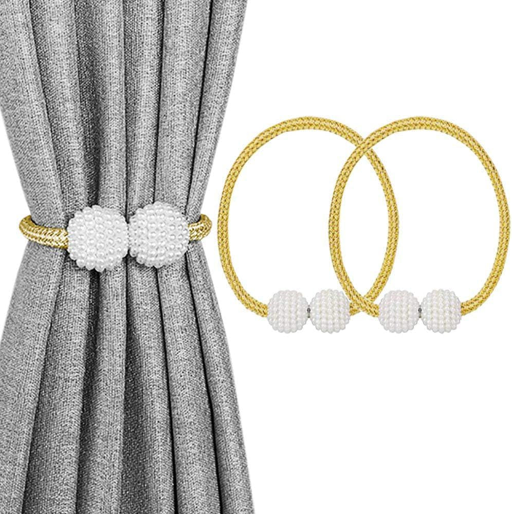 Gray curtain held by a gold braided cord with two white beaded pearl ball magnets and two matching loose loops.