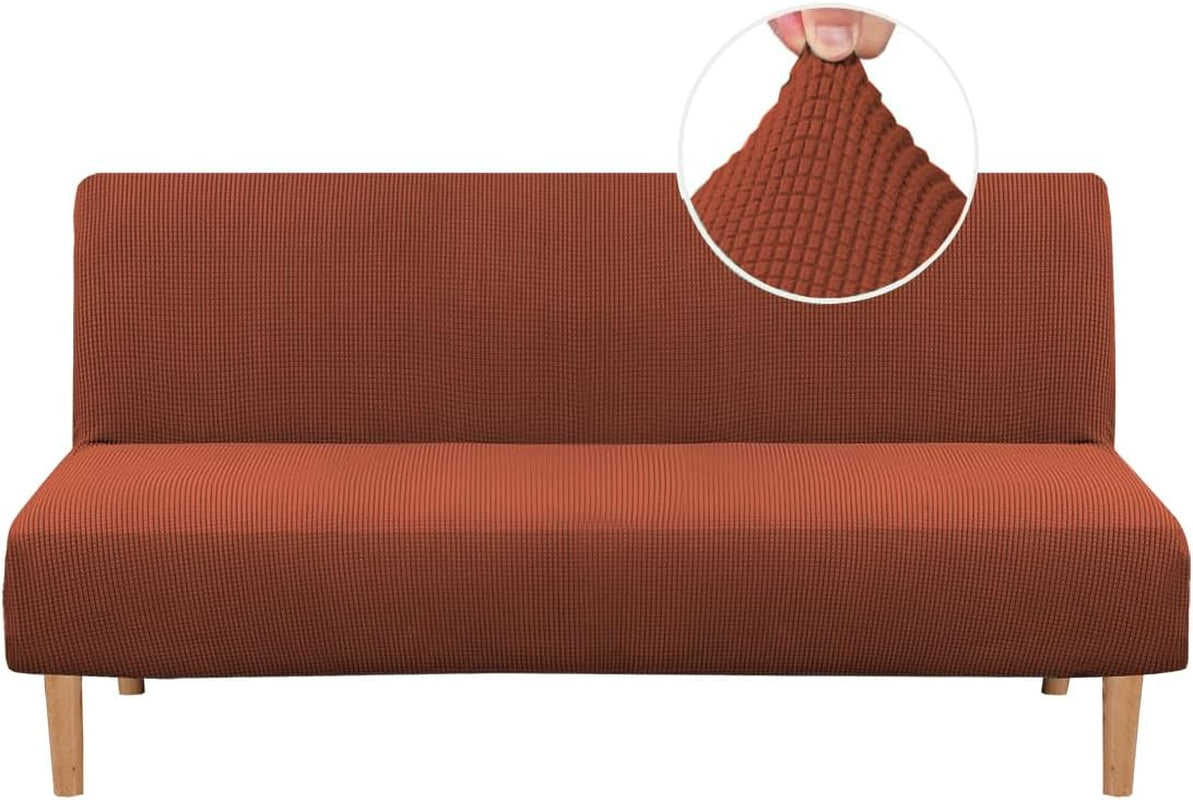 Front view of a futon in a rust-colored small-check textured slipcover with inset fabric close-up