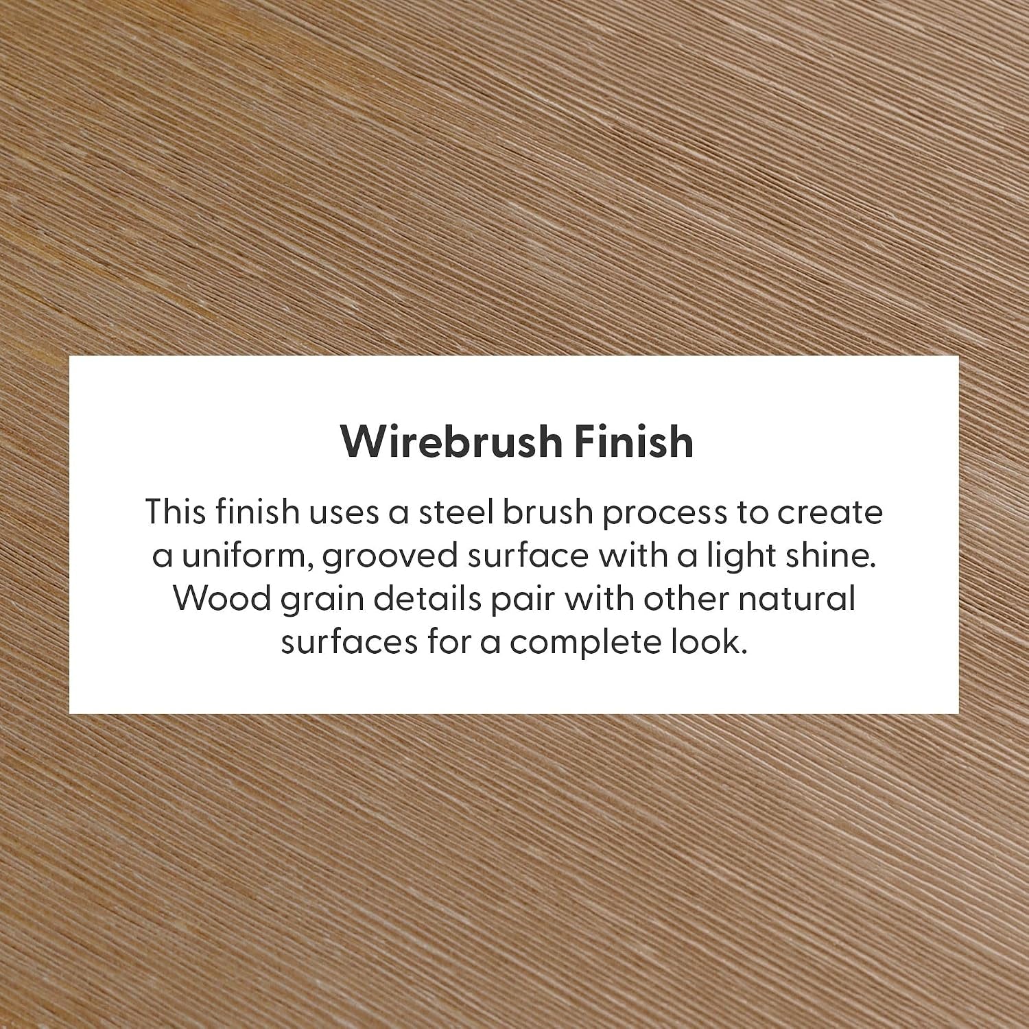 Close-up of light brown wood surface showing uniform diagonal grooves and textured wirebrushed grain.
