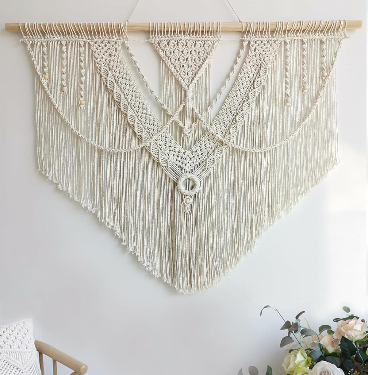 Close crop of the center panel highlighting a wrapped circular ring and crisscrossed rope details.