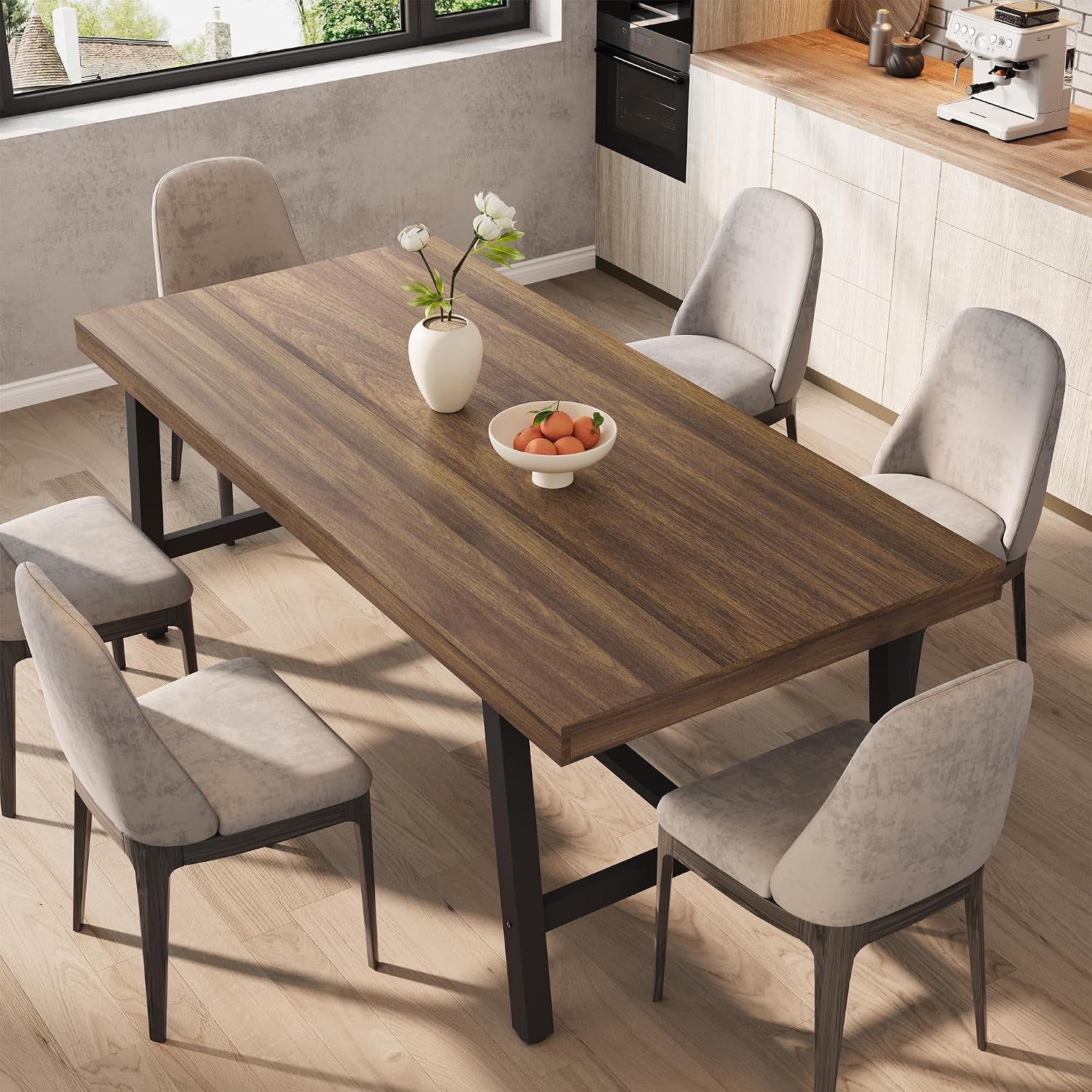 Top-down view of brown laminate rectangular table set with six gray chairs in a modern kitchen scene
