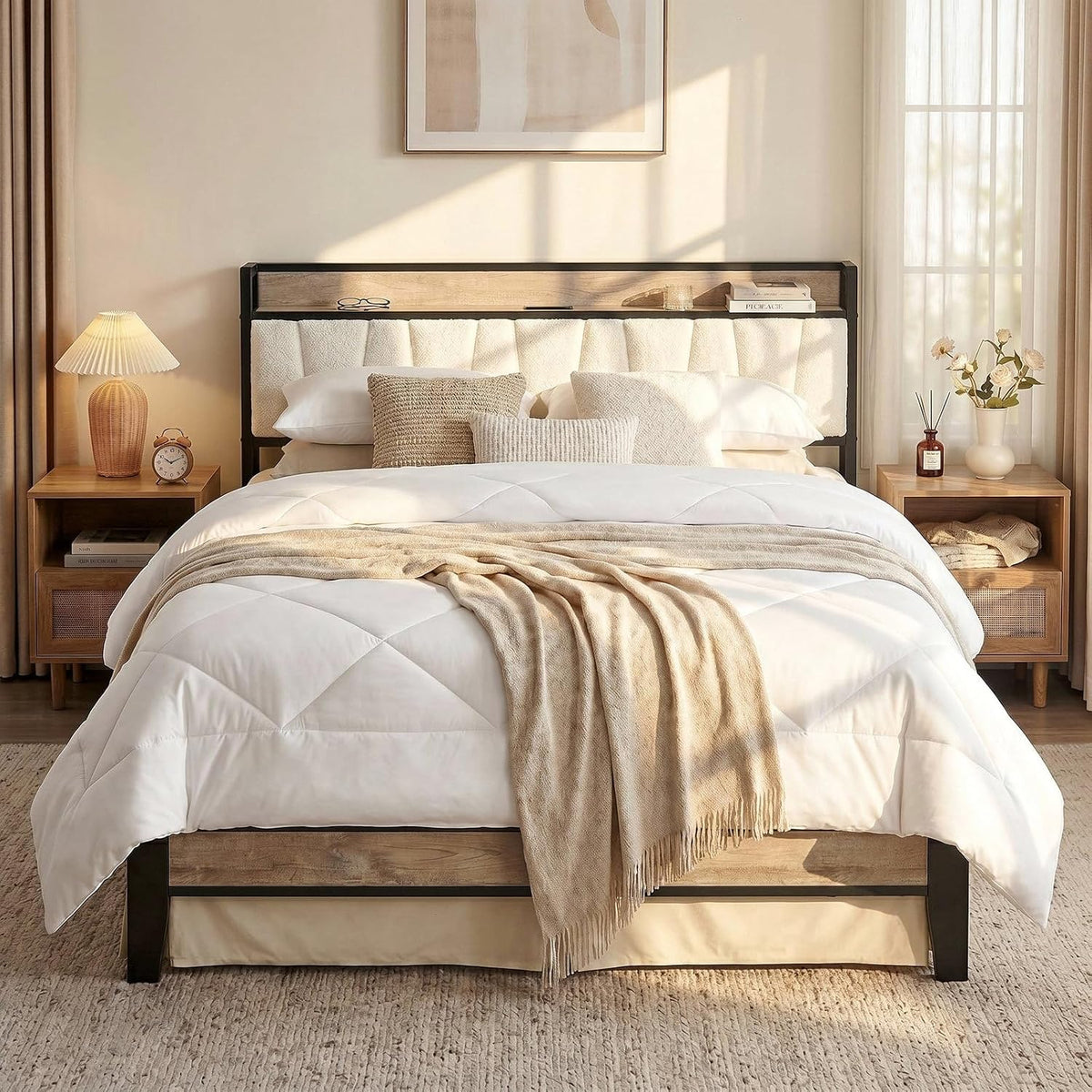 Front view of bed with light wood headboard shelf and cream tufted upholstery in a sunlit bedroom.