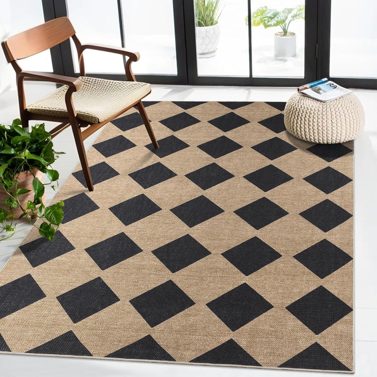 Tan rug patterned with large black diamond checker shapes under a wooden chair