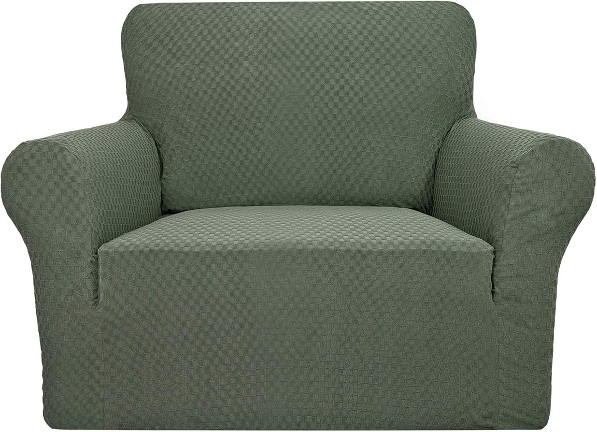 Front view of a single-seat armchair fully covered in a green textured stretch slipcover against a white background.