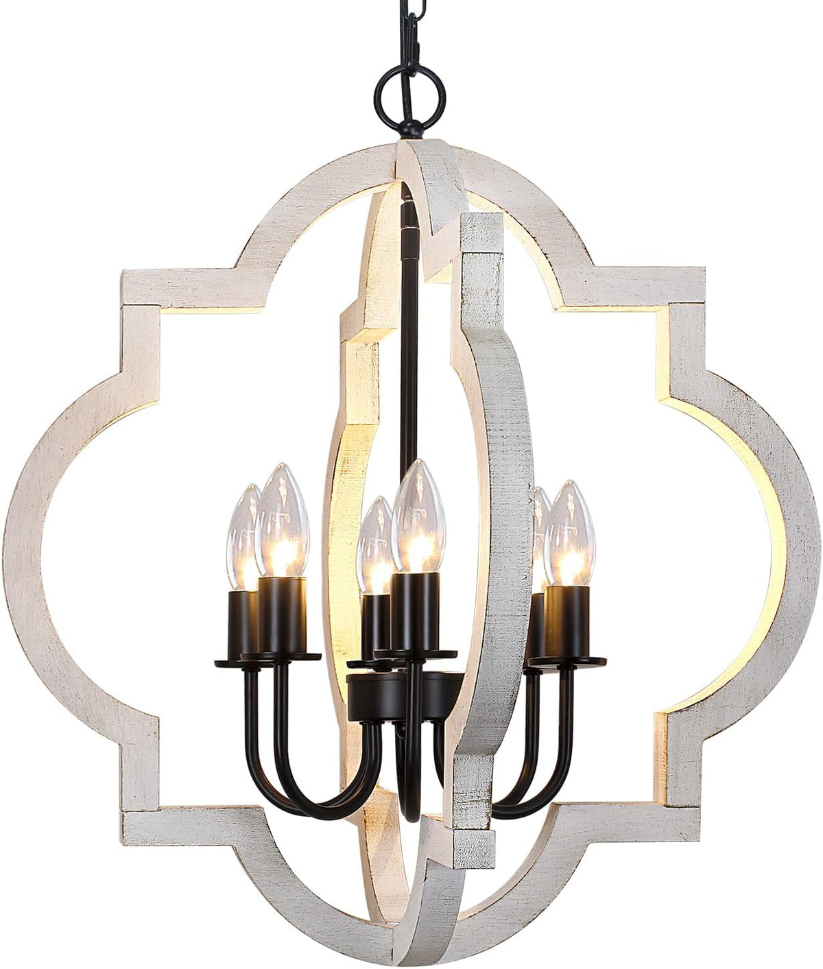 Close crop showing light-painted wood quatrefoil frame with inner black metal candle arms and lit bulbs