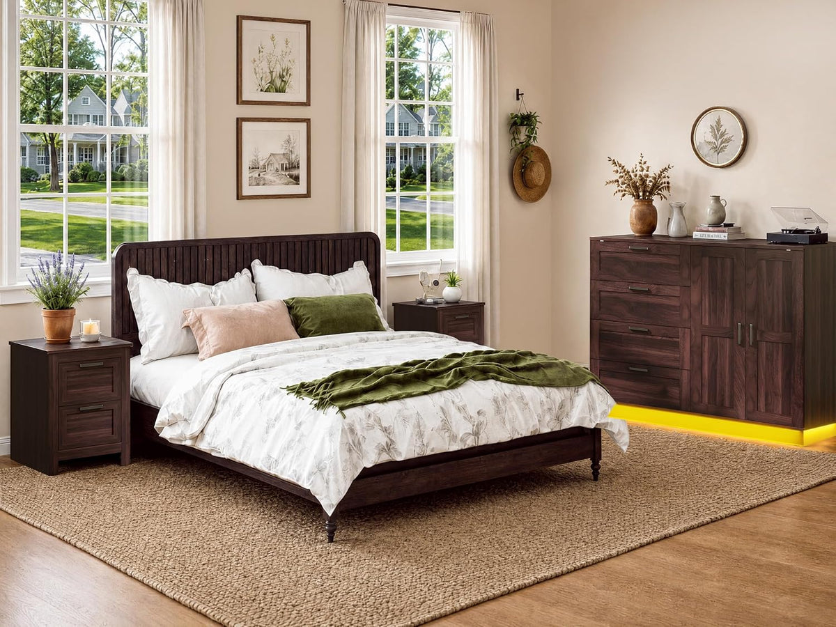Bedroom lifestyle shot with matching dark wood bed and armoire at right, large windows, woven rug and yellow LED under the