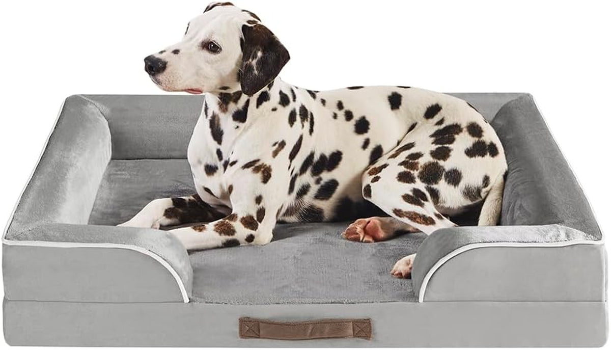 Overhead view showing a Dalmatian lying inside the rectangular grey bed with a stitched fabric handle on the front