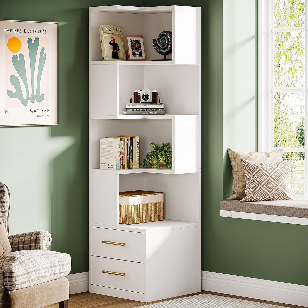 White corner bookcase with closed drawers in a green living room