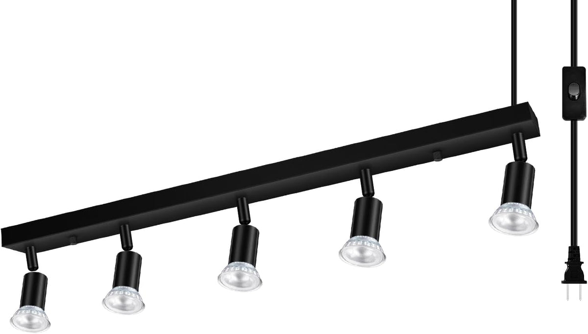 Long black track bar with five adjustable black spotlight heads and a plugged cord with inline switch