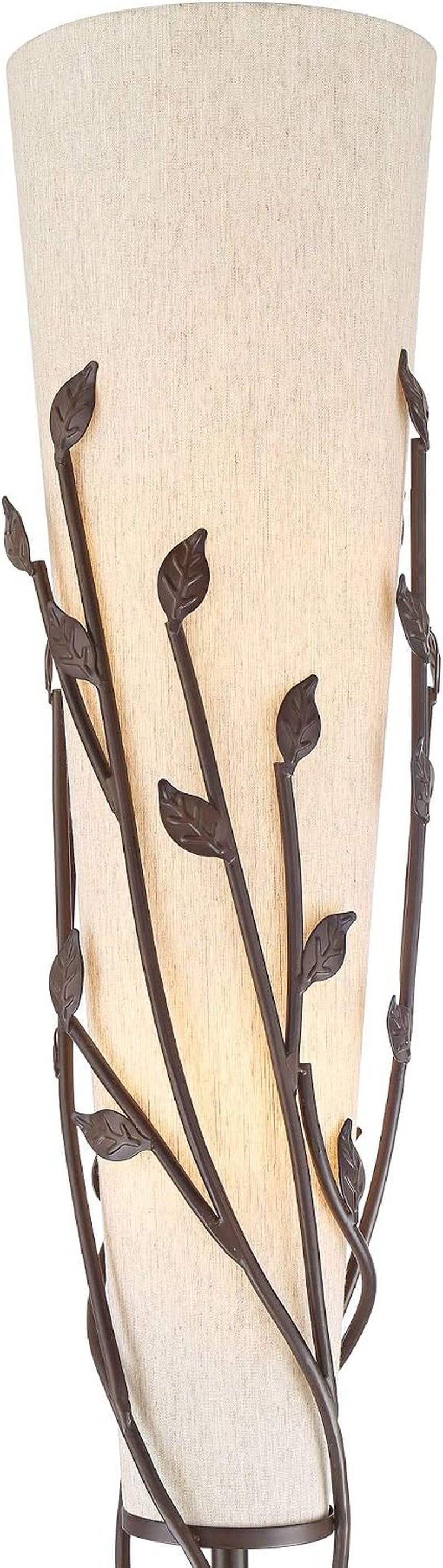 Detail view of the cream tapered linen shade with multiple metal leaf accents along the shade