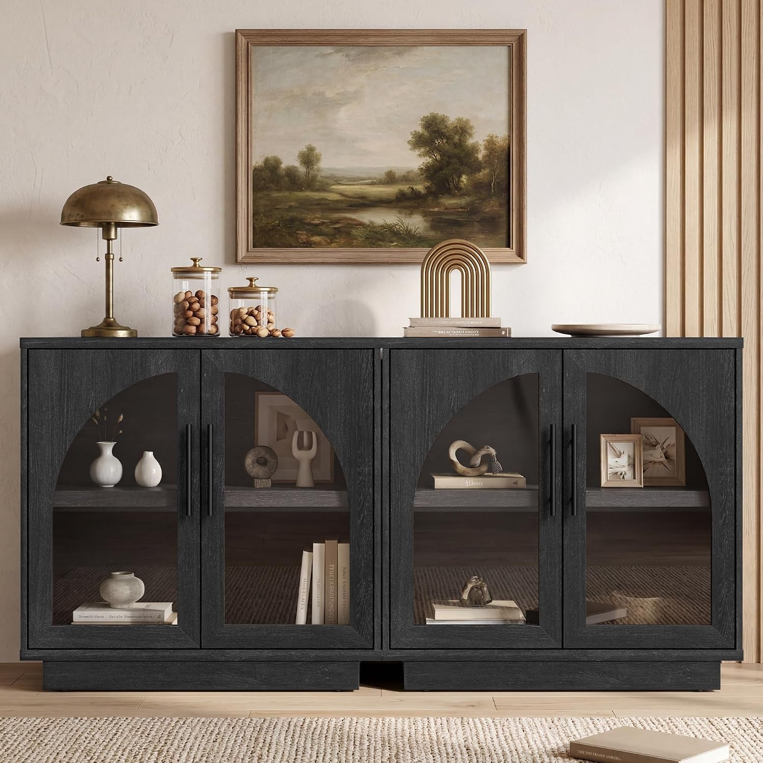 Charcoal buffet with four arched glass doors showing interior shelves and decor items.