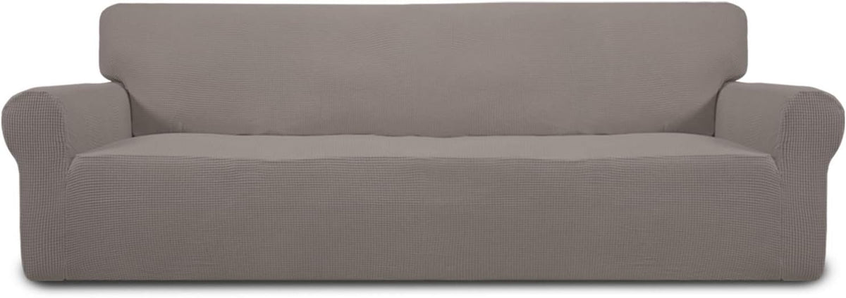 Front view of a light taupe loveseat cover showing a continuous seat seam and rounded arm contours.