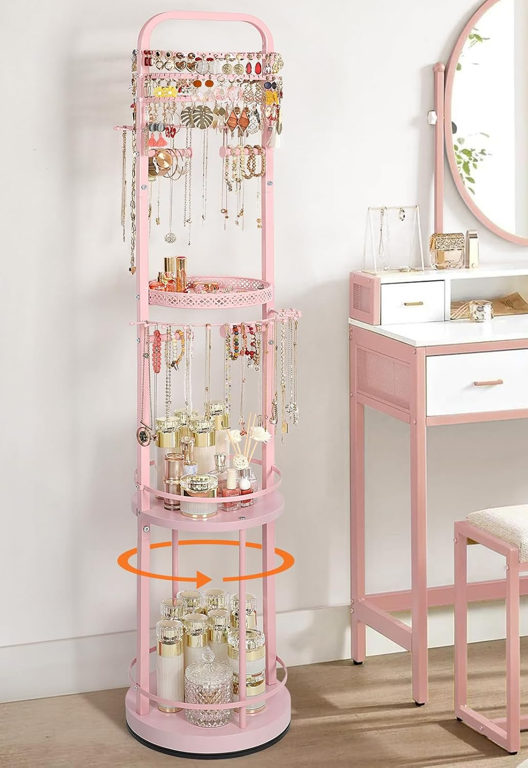 Pink rotating organizer angled view showing necklaces, bracelets and cosmetics on middle and lower shelves