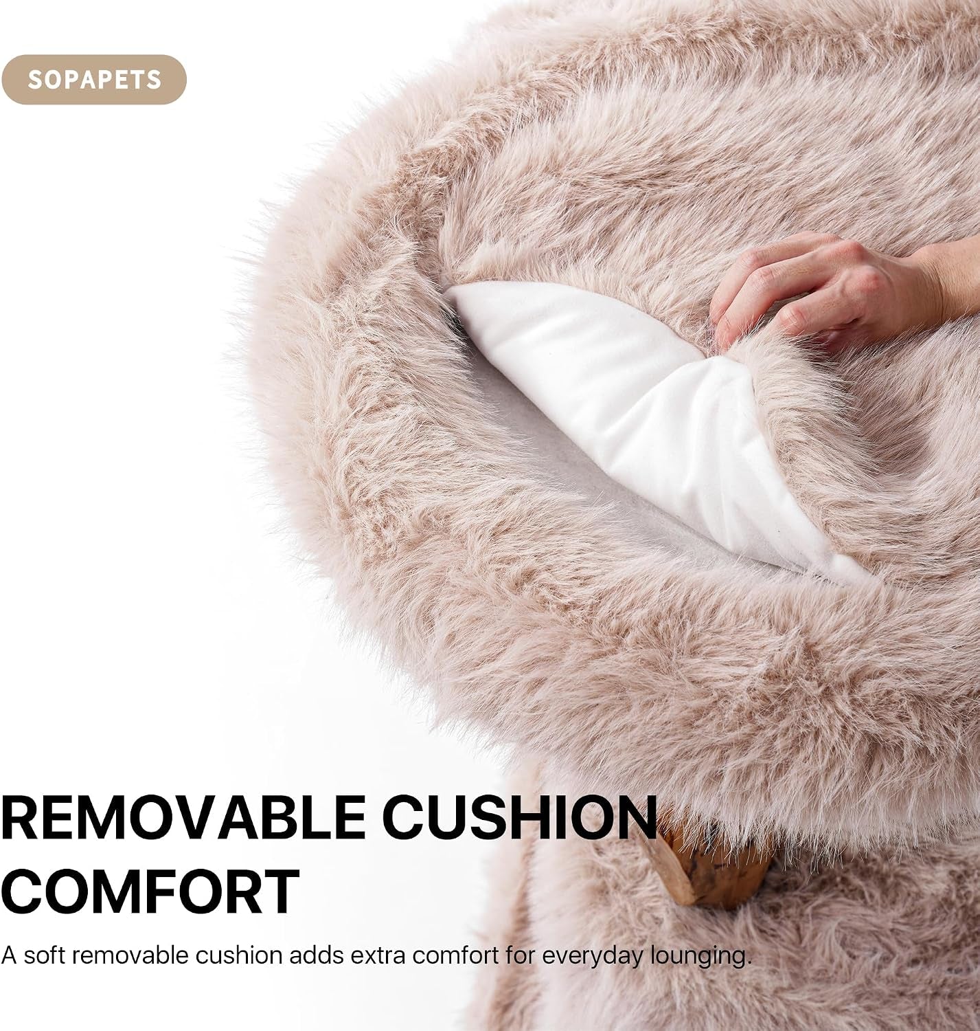 Hand lifting the removable beige faux-fur cushion to reveal the inner white cushion.