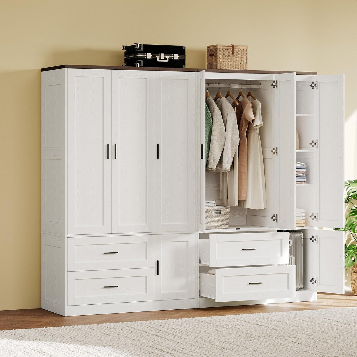 Cropped view of the wardrobe’s right section with doors open, hanging rod with clothes, open drawers and items on top.