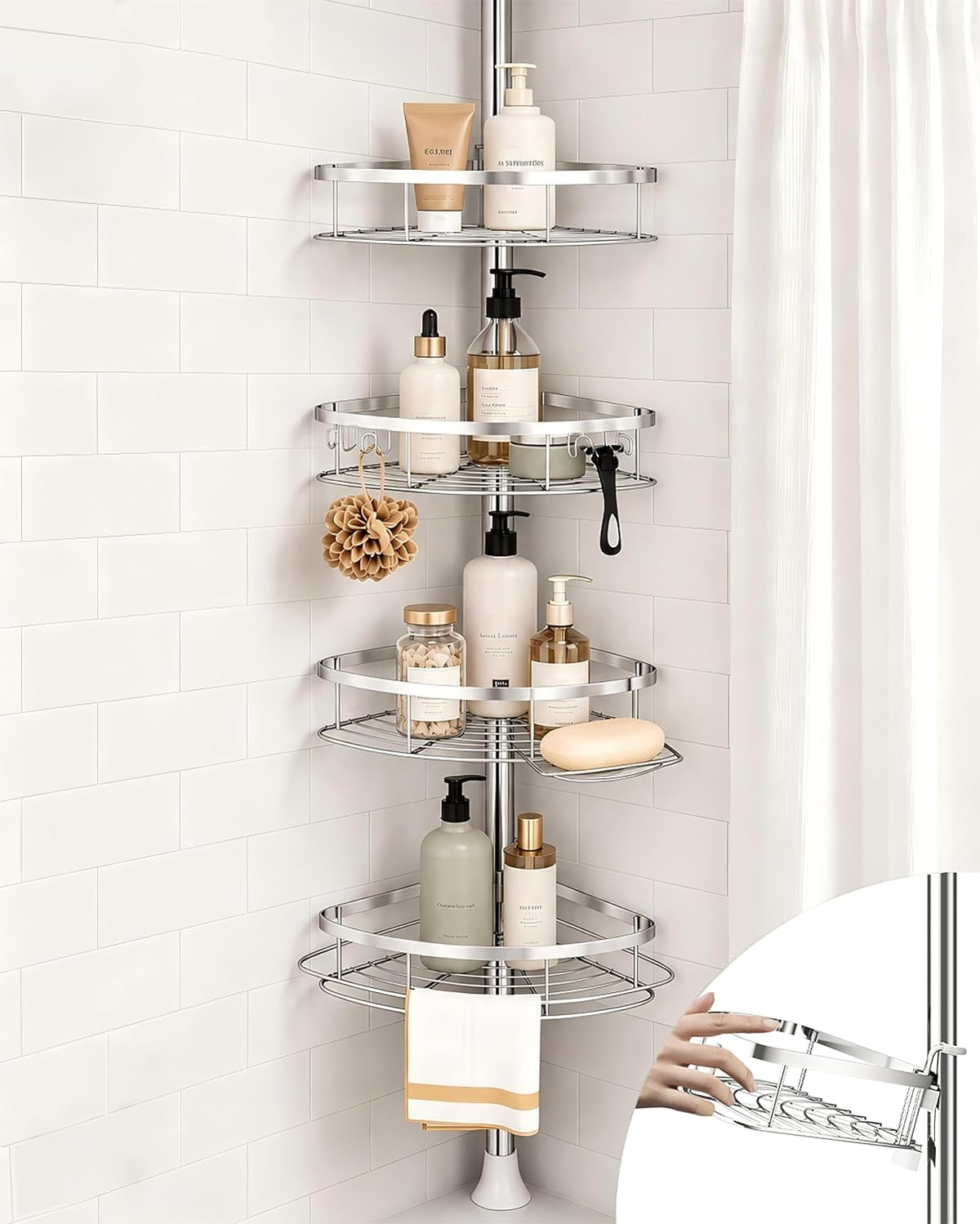 Close-up of three chrome corner baskets loaded with toiletries, showing hooks and a towel draped on the lower bar