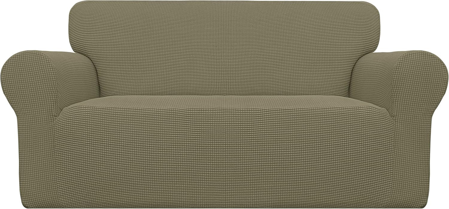 Front view of a two-seat loveseat covered in a warm taupe textured stretch slipcover on a plain background.