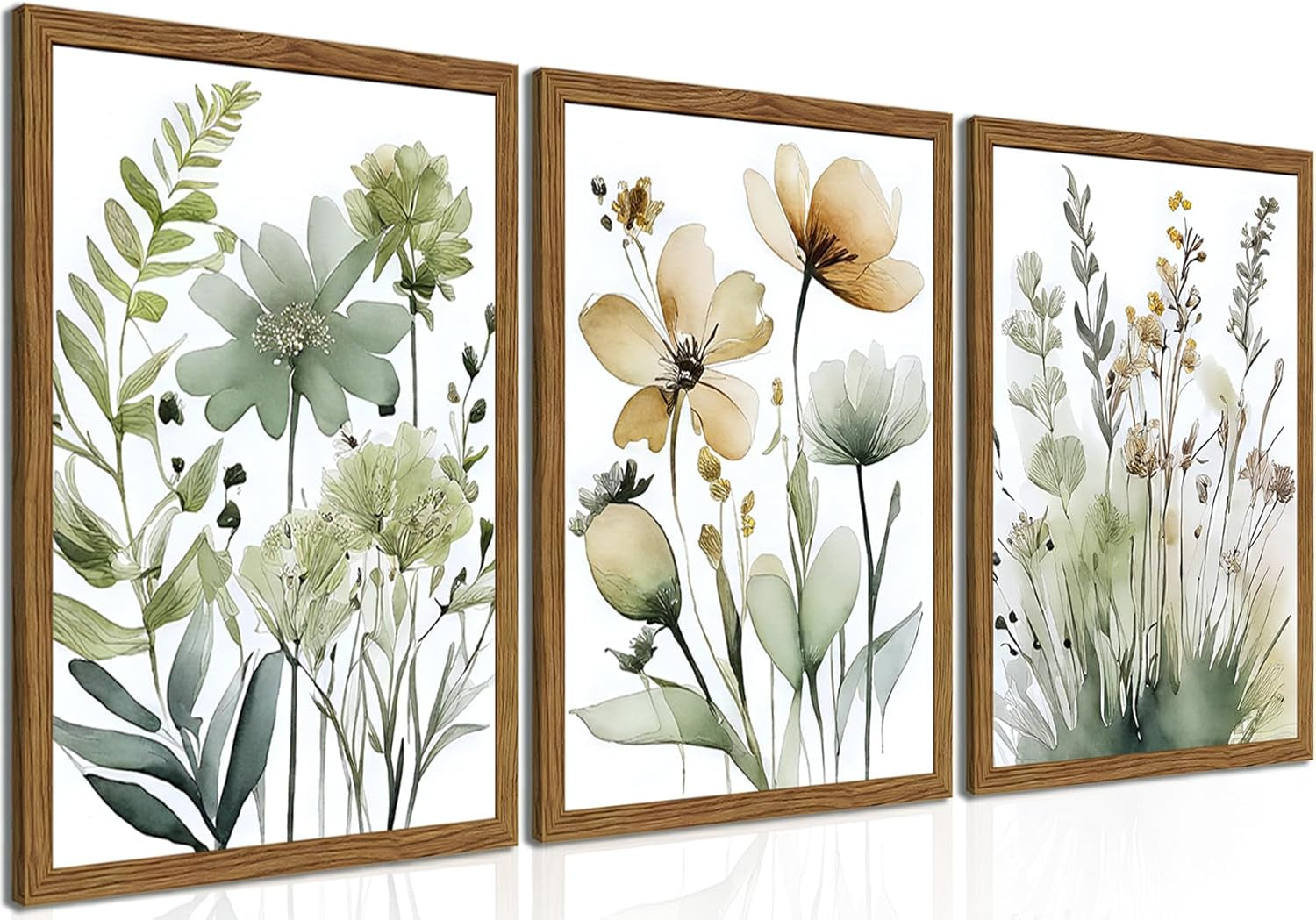 Three framed panels displayed front-on showing green and gold watercolor botanicals with matching wood-look frames and