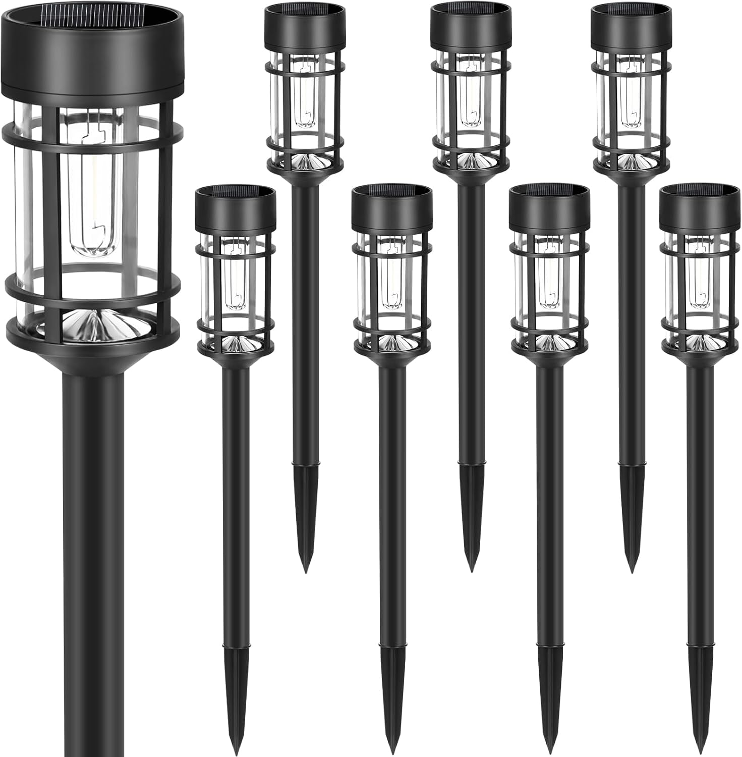 Eight assembled black solar pathway lights on a white background showing tops, poles, and pointed stakes