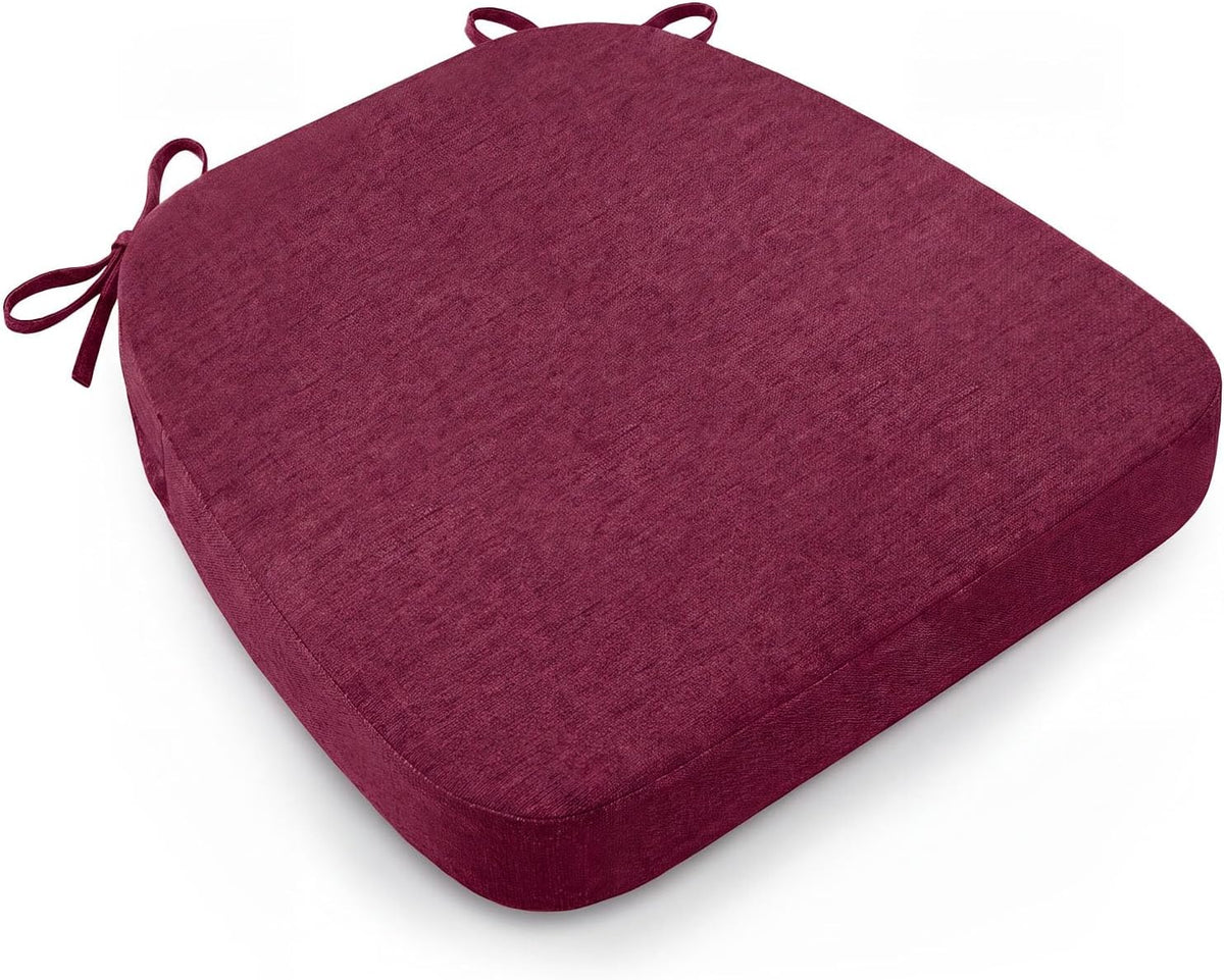 Single burgundy D-shaped chair cushion shown at an angle, highlighting rounded front and corner tie loops.