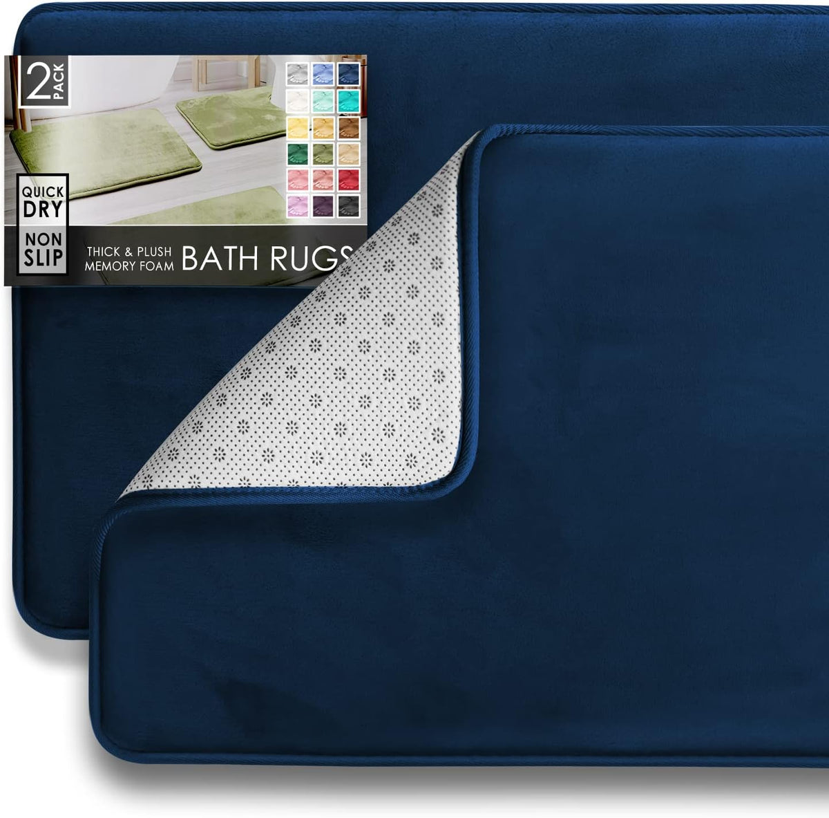 Two navy rectangular bath rugs layered with a corner lifted to show patterned non-slip underside