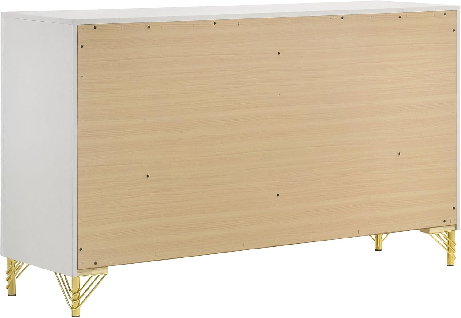 Rear of a white dresser showing wood back panel and decorative gold metal legs.