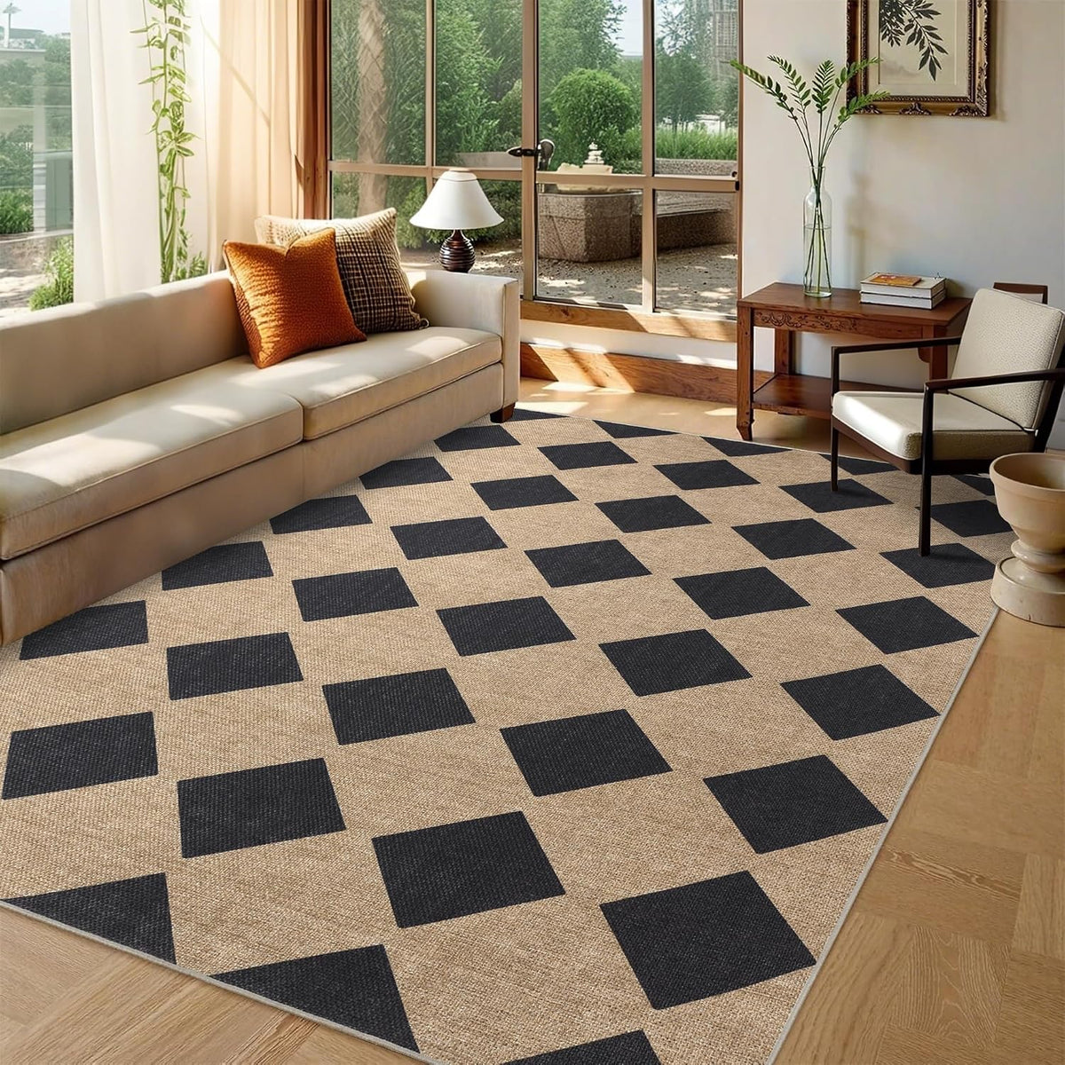 Black-square patterned rug in a bright room with a long beige sofa and side table
