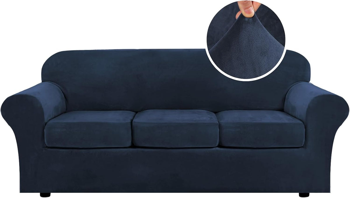 Front-facing deep navy three-cushion sofa shown with a circular inset of a hand pinching the plush fabric.