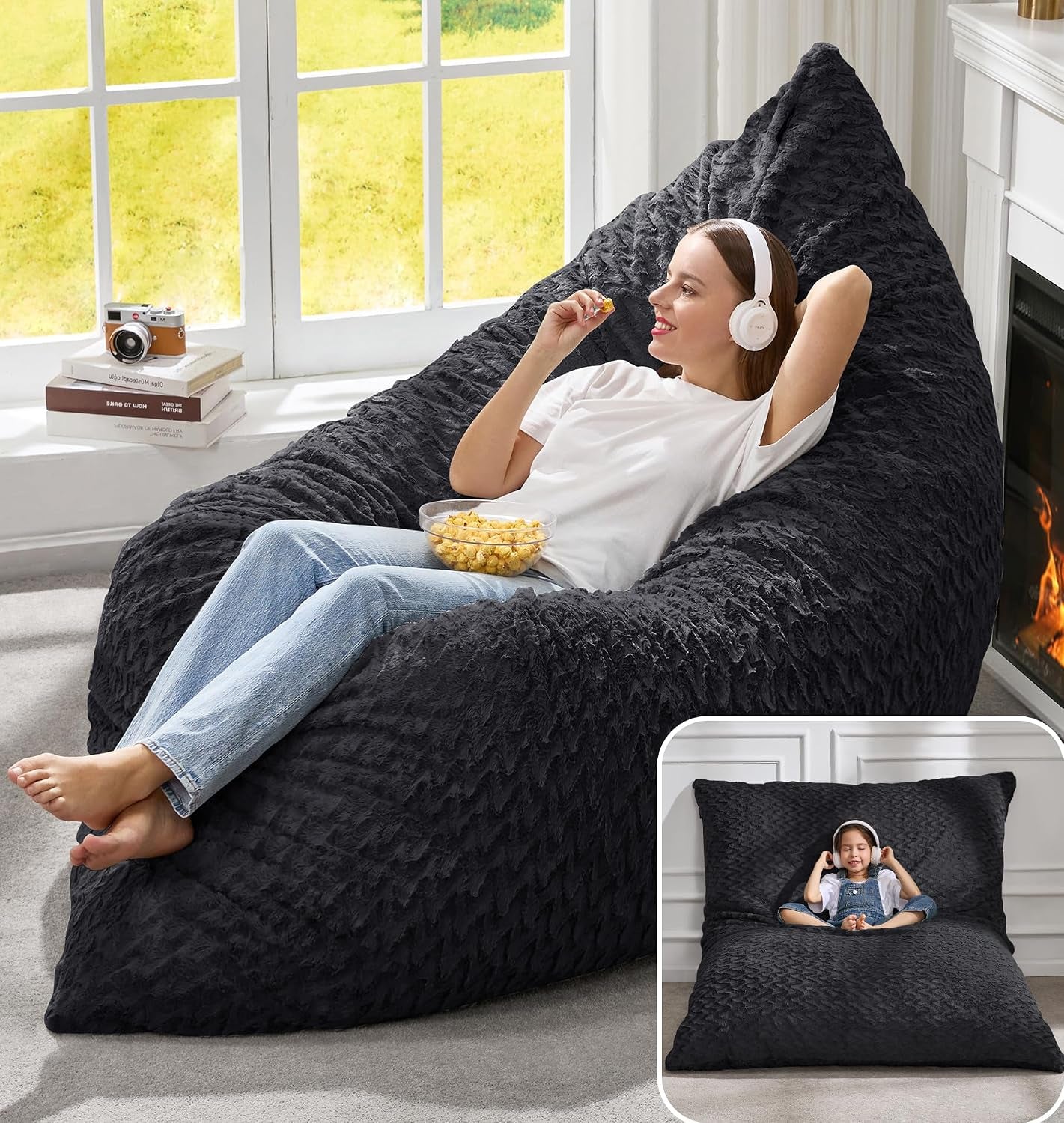 Woman with headphones and a bowl of popcorn lounging on a deep black textured beanbag chair, inset shows child seated on