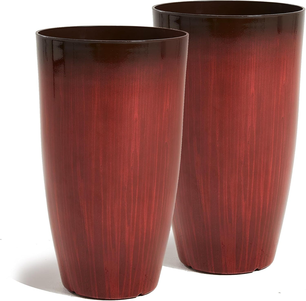 Close-up of two tall cylindrical red wood-grain planters shown side by side.