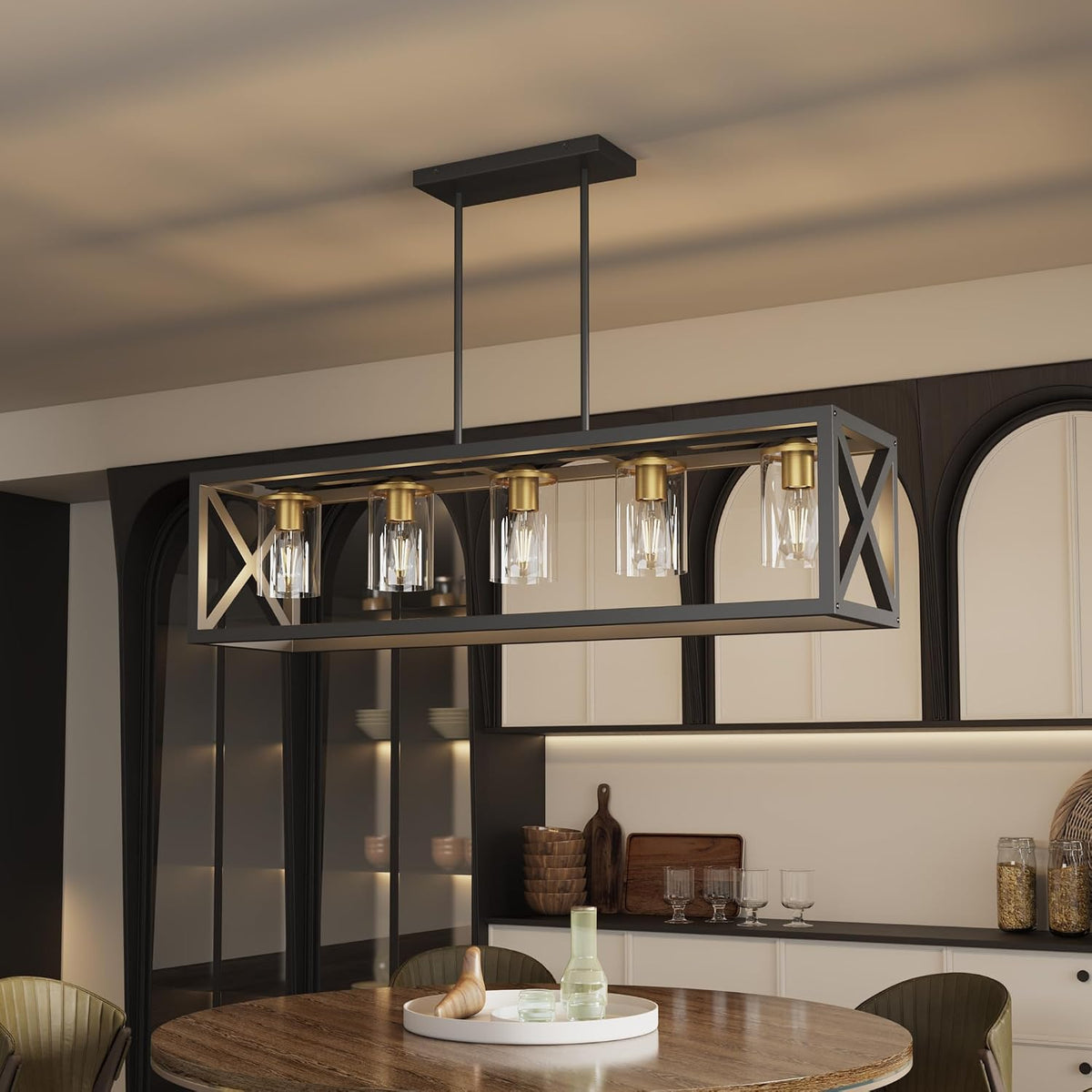 Black-and-gold rectangular 5-light pendant angled front view with clear glass shades over a round dining table