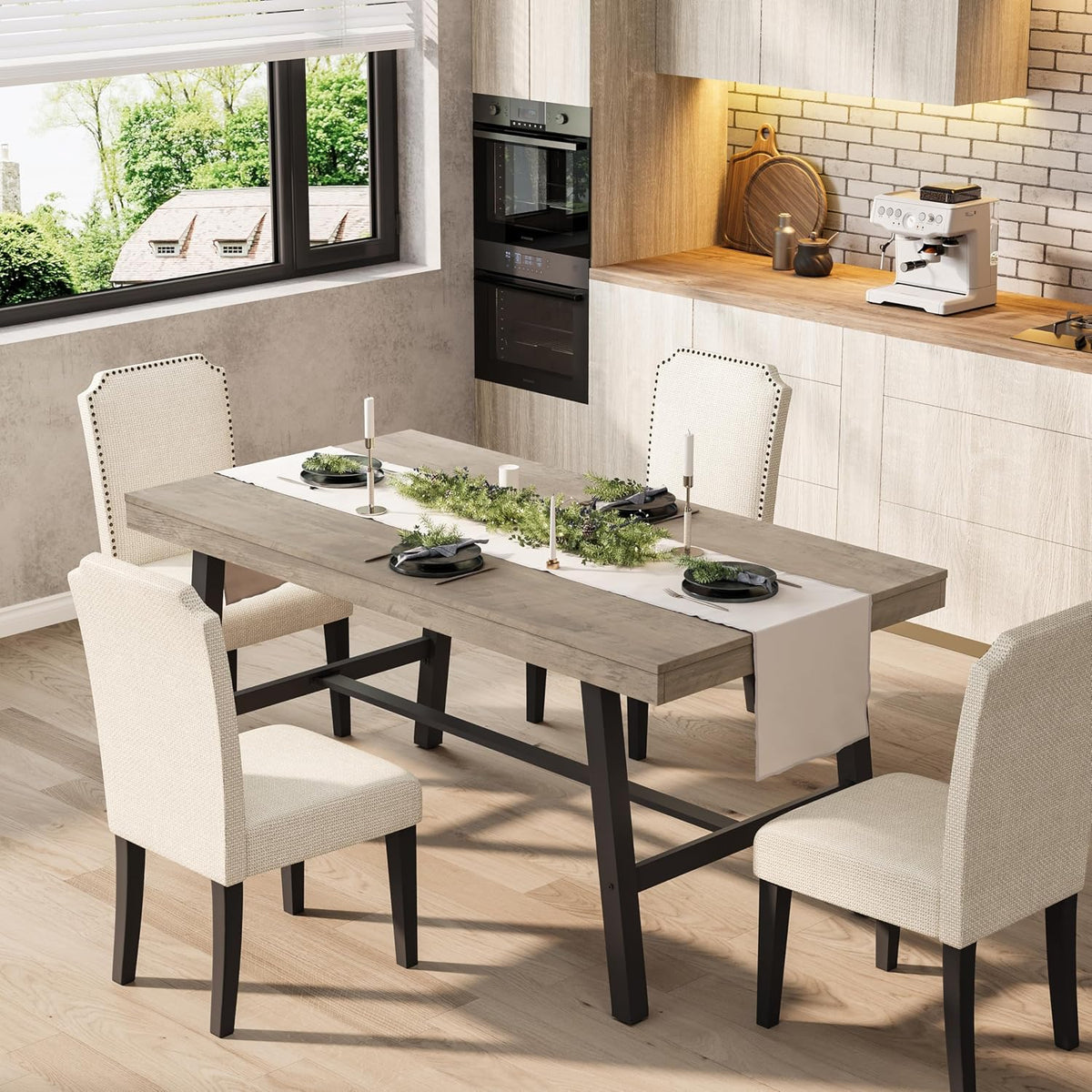 Light gray wood tabletop on black metal base surrounded by beige upholstered chairs and table runner centerpiece.