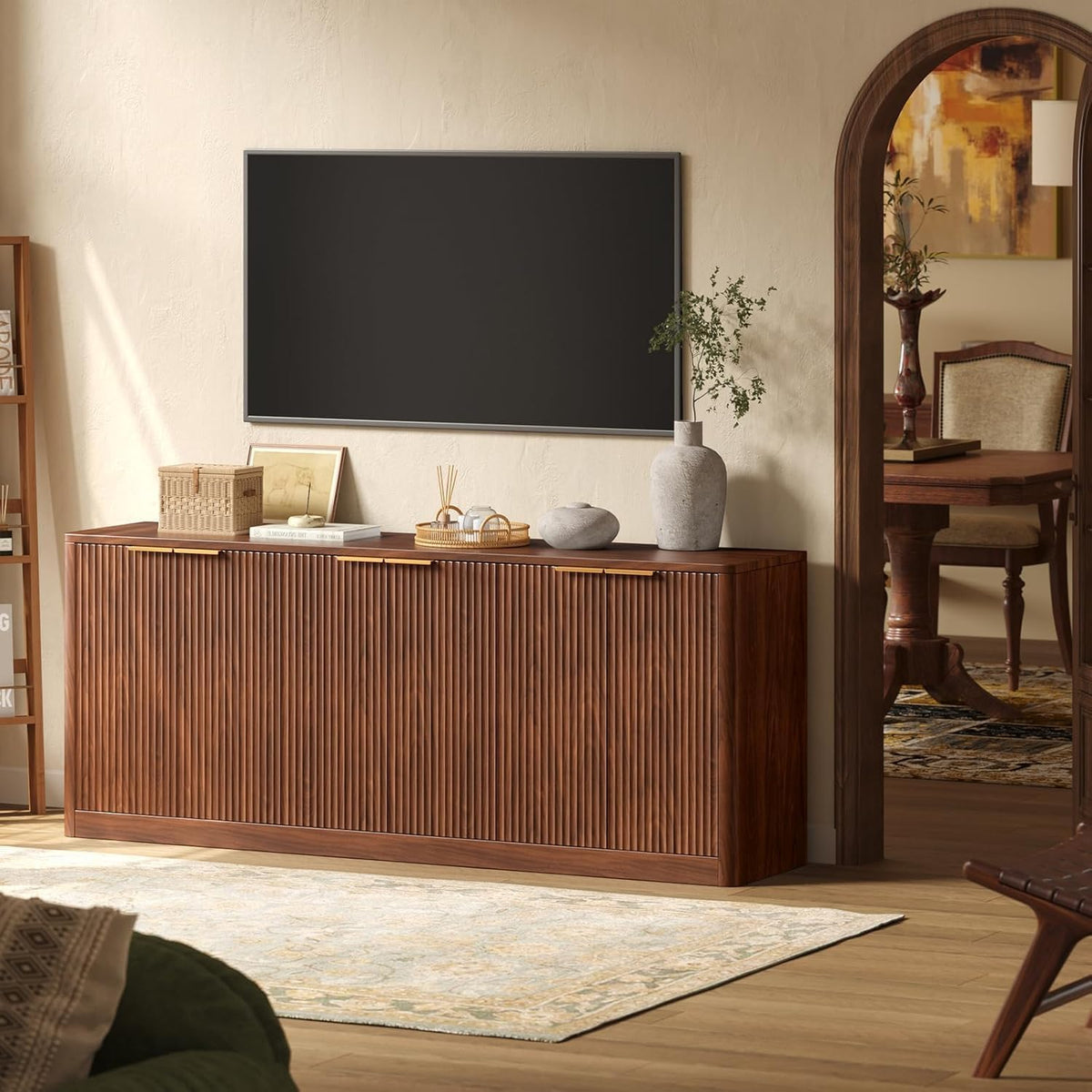 Walnut fluted sideboard styled as a TV console beneath a wall-mounted television, front view