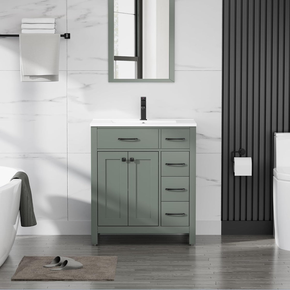 Styled bathroom with a single green vanity, white countertop and black faucet centered under a mirror, towel bar and toilet