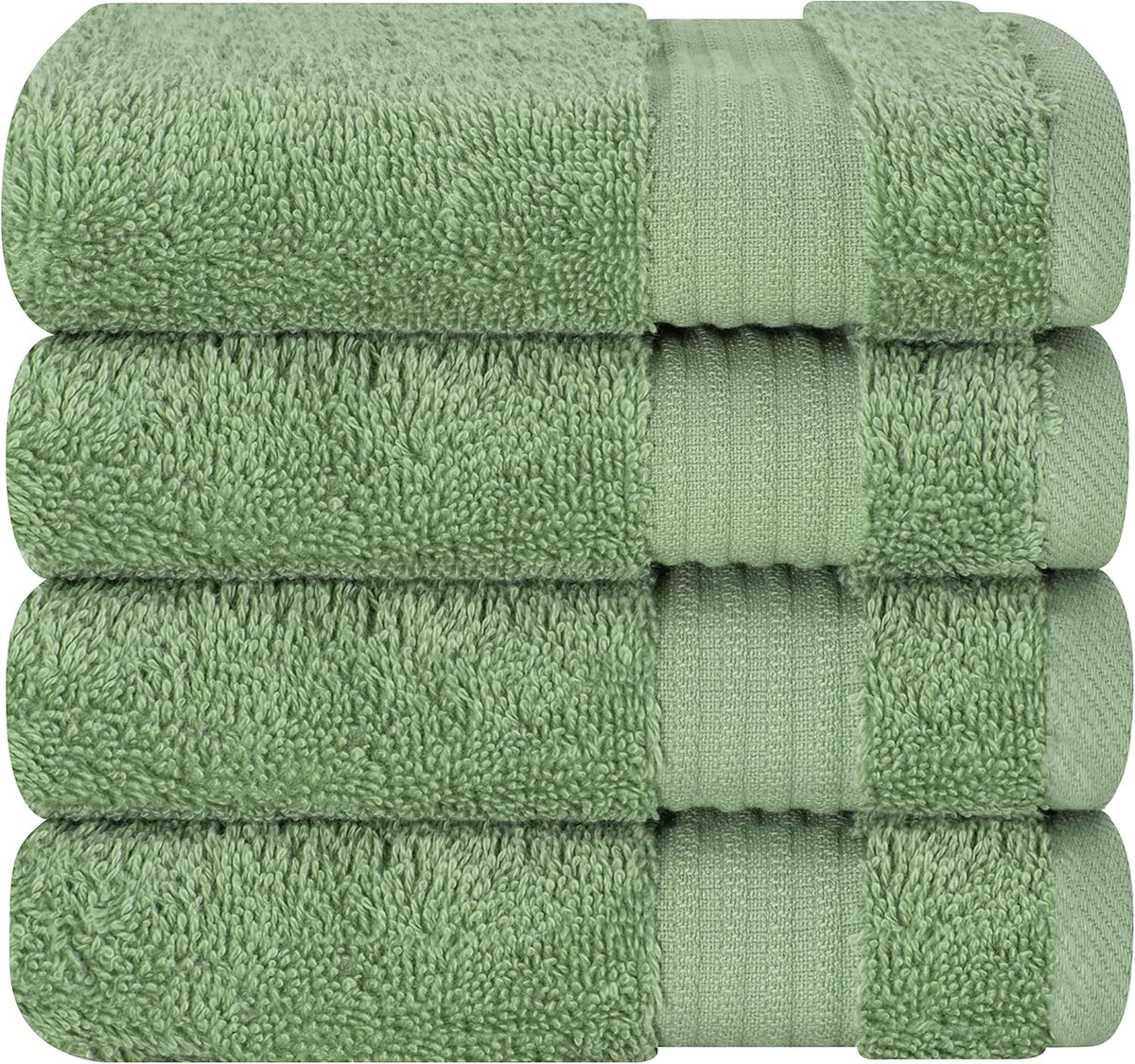 Close stacked view of four rolled light-green terry towels showing ribbed bands and plush loops