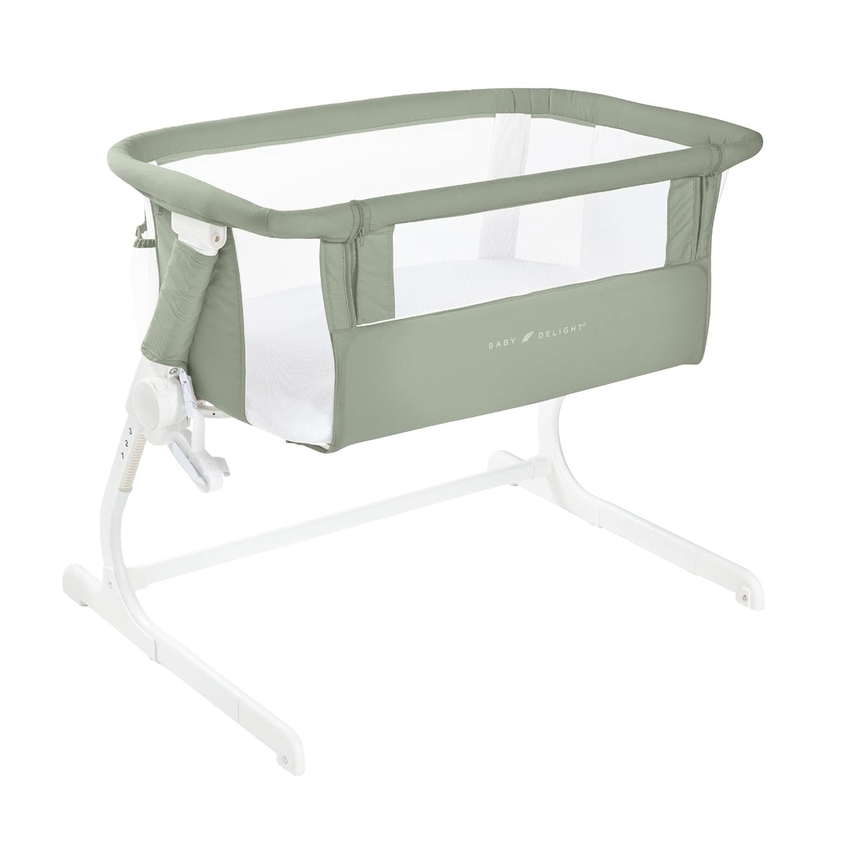 Sage green bedside bassinet with mesh sides and white frame, shown from front corner