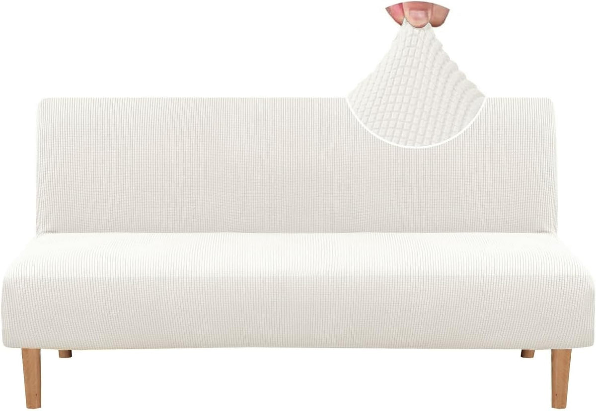 Front view of a white small-check textured slipcover fitted on an armless futon with light wooden legs.