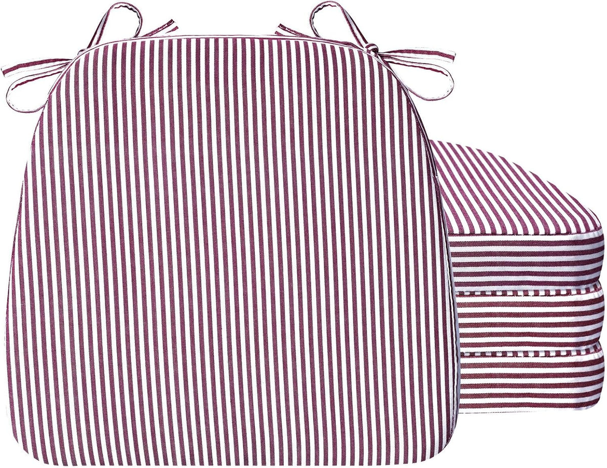 Front-facing burgundy-and-white vertical striped D-shaped cushion with two matching cushions stacked to the right, ties at