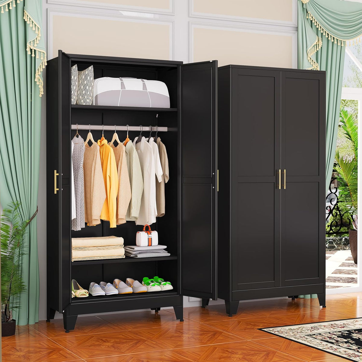 Pair of black wardrobes; left one open with hanging clothes, folded linens on a middle shelf and shoes on the bottom shelf