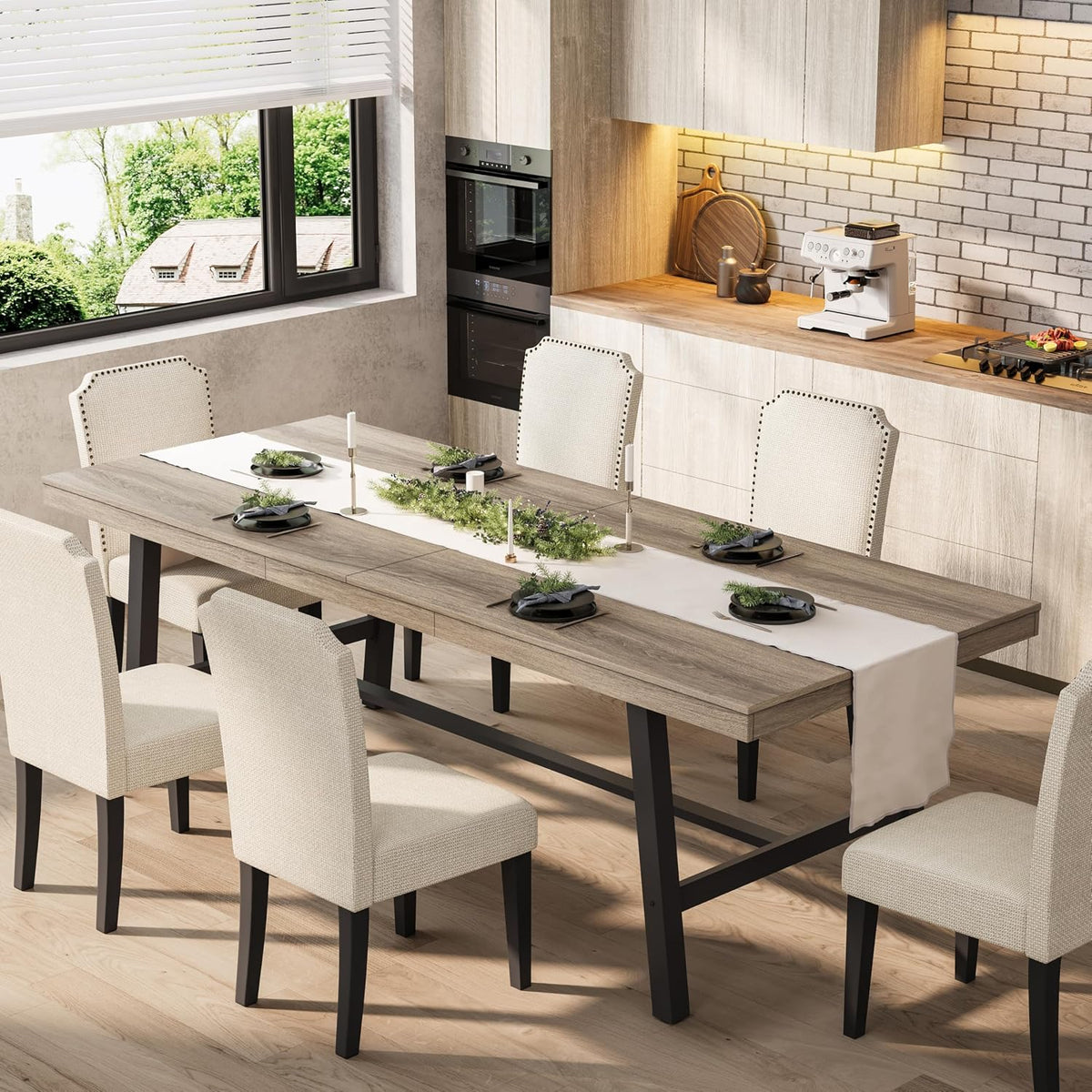 Weathered gray wood tabletop and black metal trestle base shown with neutral dining chairs.