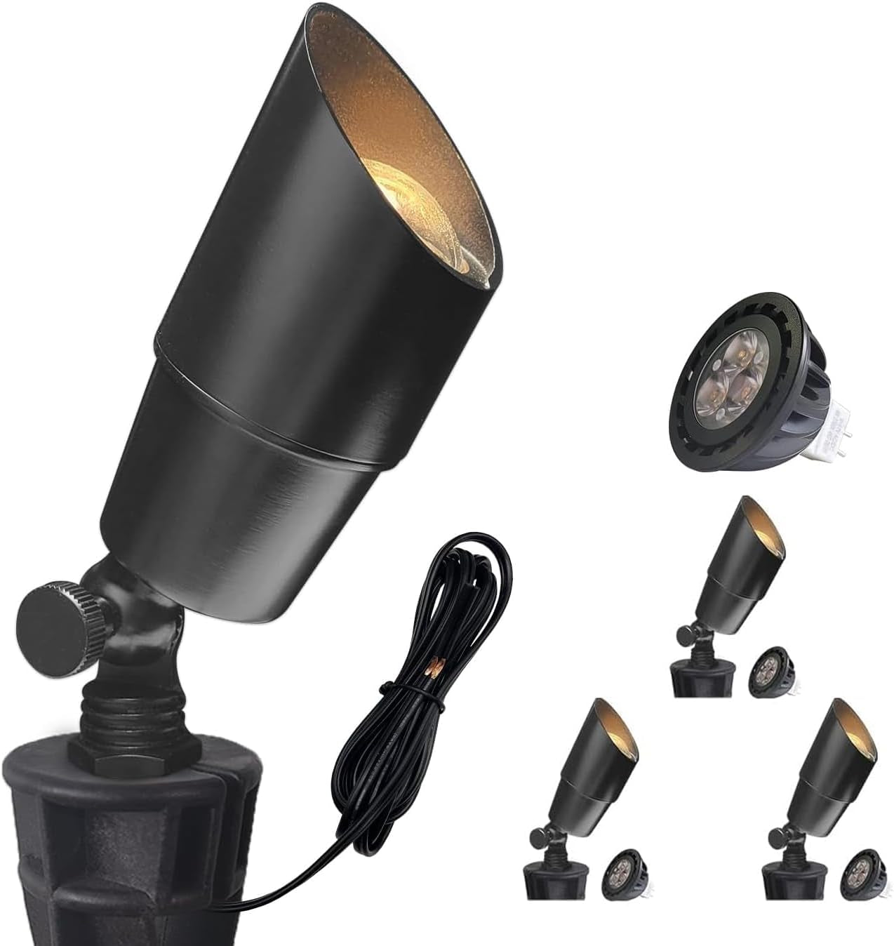 Angled bronze landscape spotlight on a black stake base with coiled cable and a separate MR16 bulb, plus three small