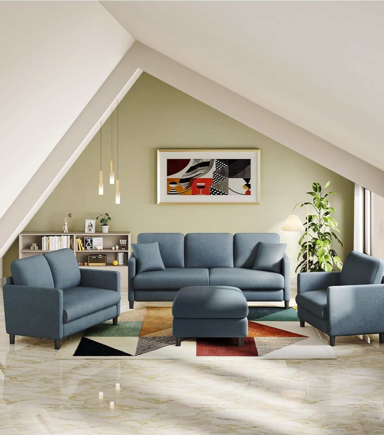 Coordinated living room set under a sloped ceiling: three-seat sofa, two matching chairs/loveseat and an ottoman in