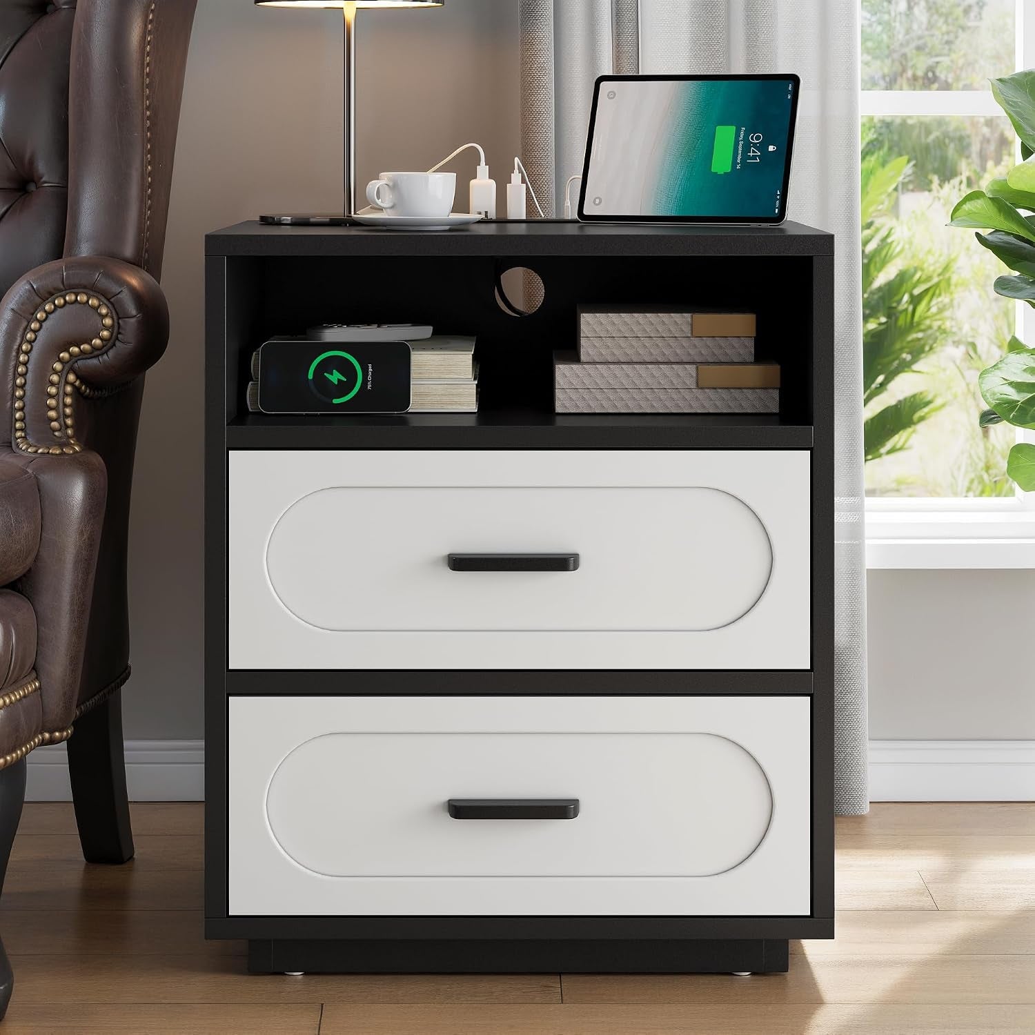 Front-facing view of nightstand showing open shelf with cable hole and two white drawer fronts