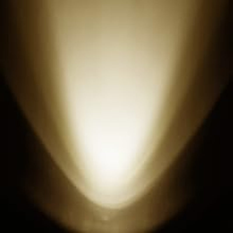 Warm white conical light beam fading outward on dark background to show beam shape