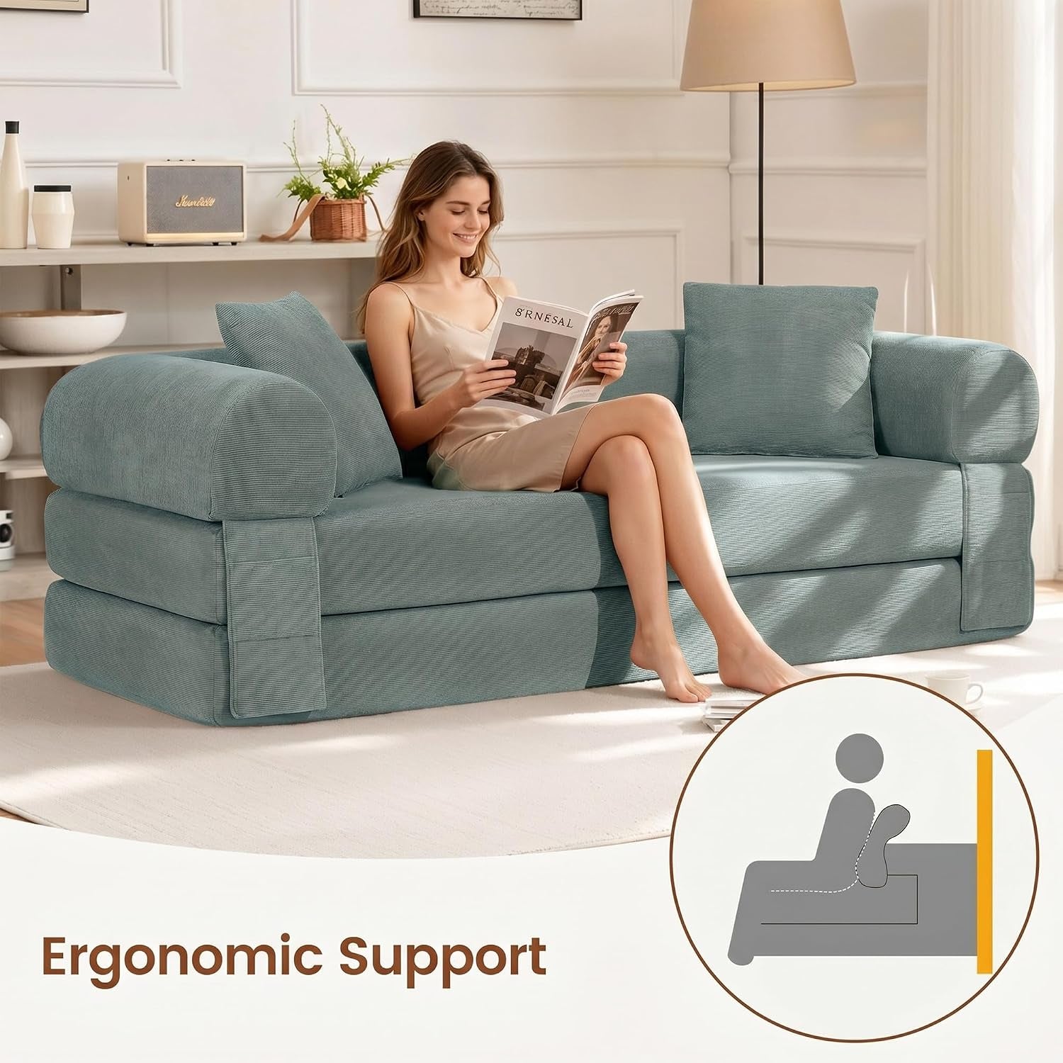 Front view of the light green convertible sofa as a seated couch with two cylindrical pillows and arm supports