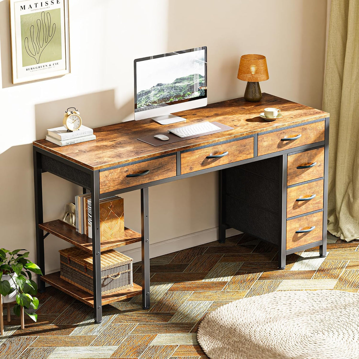 Sunlit workspace view showing the desk styled with a lamp, plant and woven basket on the shelves.