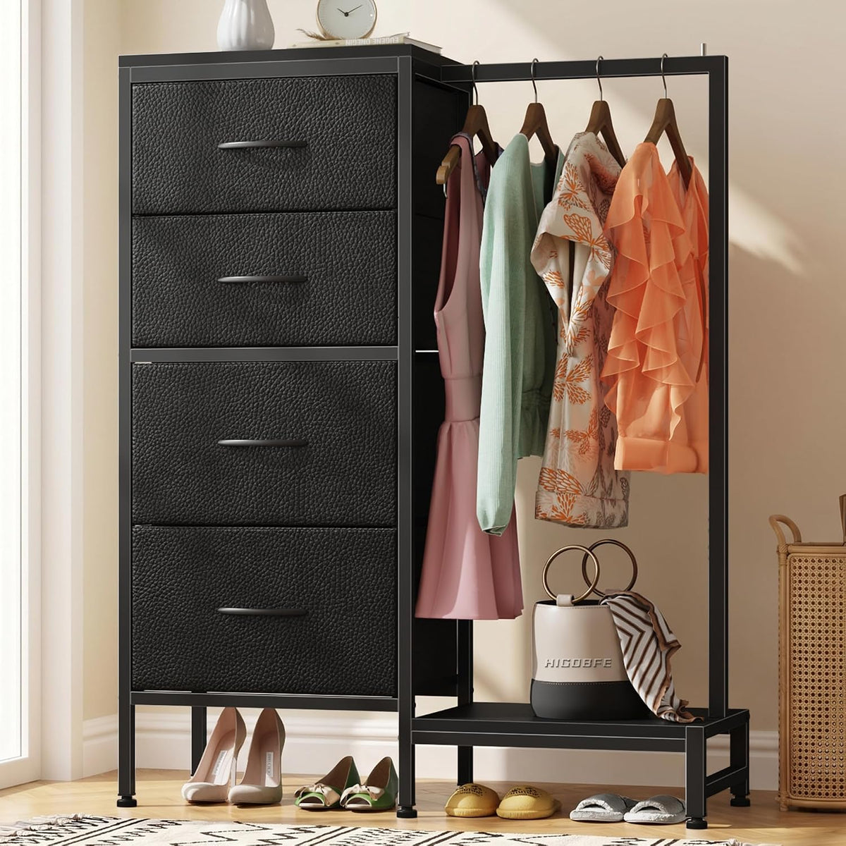Black four-drawer dresser and hanging rack displaying clothes and shoes