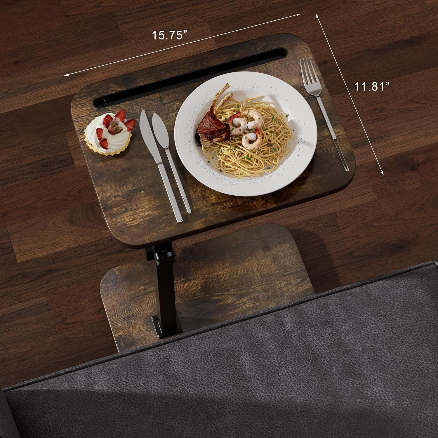 Top-down view of rectangular tabletop with measurements 15.75" by 11.81" and place setting on wood floor