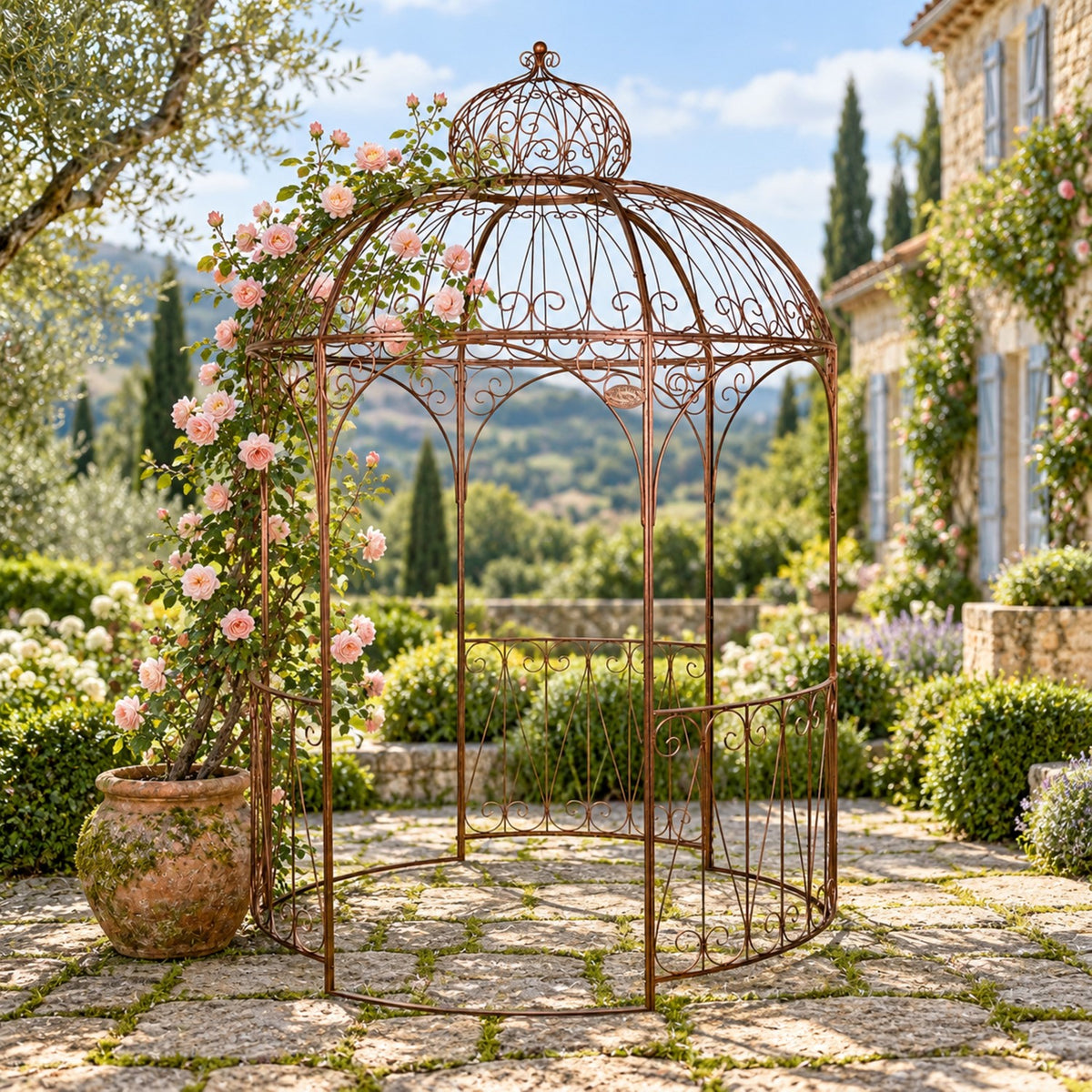 Antique bronze round iron gazebo in a garden courtyard