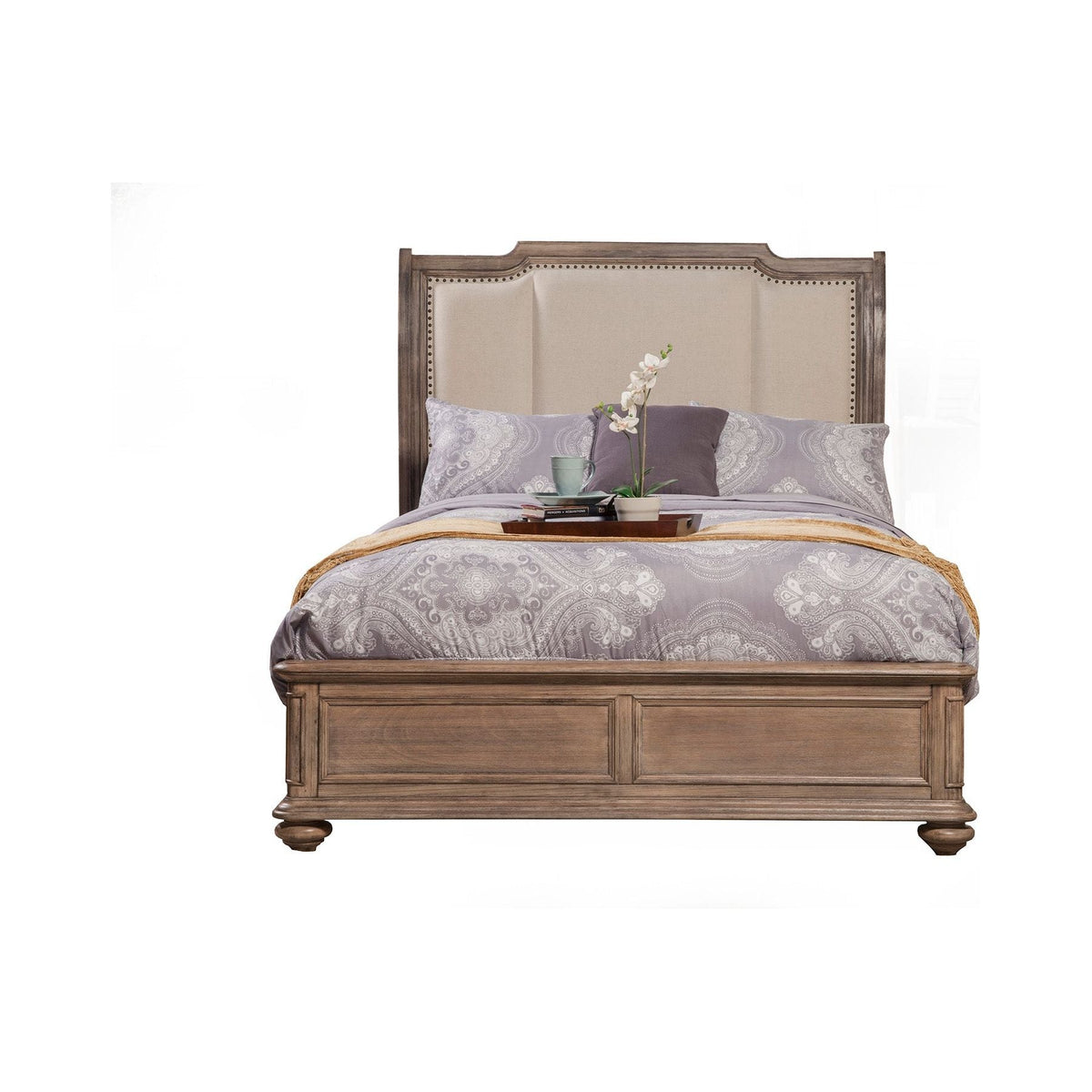 Front view of the French Truffle bed with a light upholstered headboard